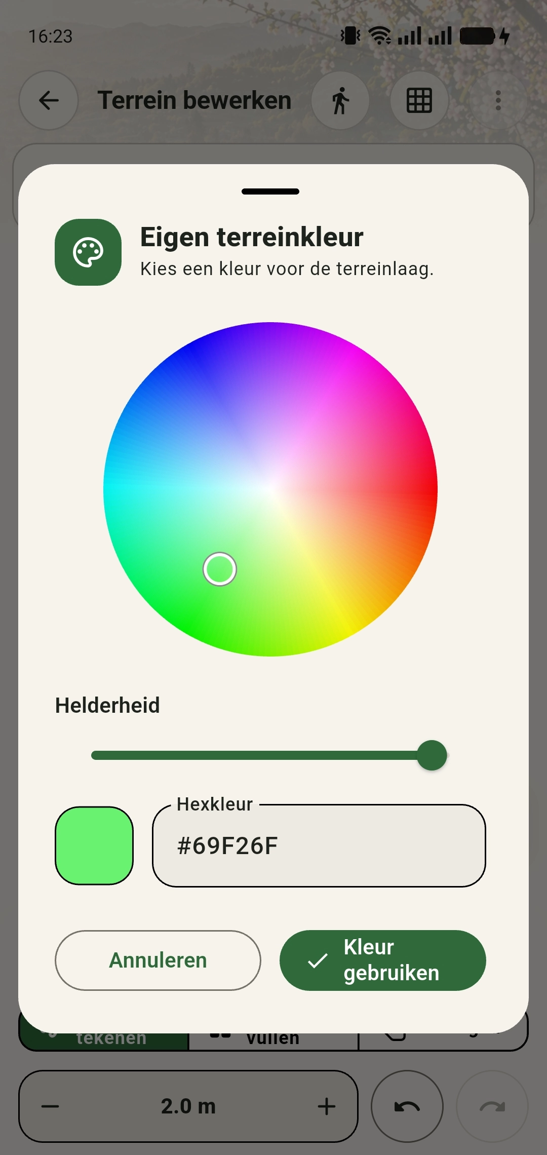 Dialoog Eigen terreinkleur met kleurencirkel, helderheid, hexkleur en de knop Kleur gebruiken